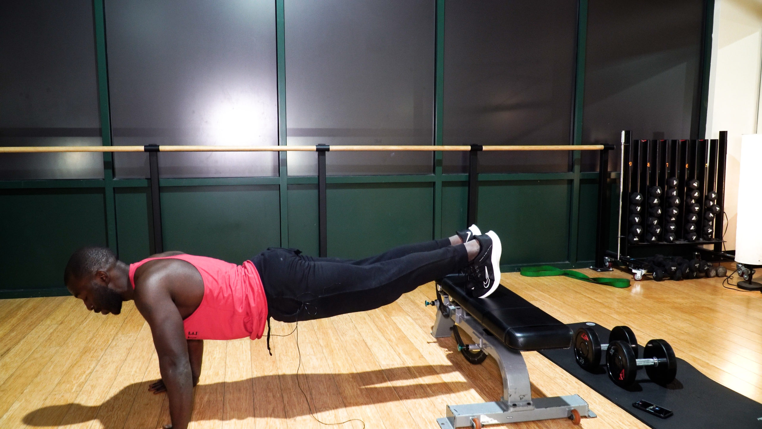 man doing elevated plank